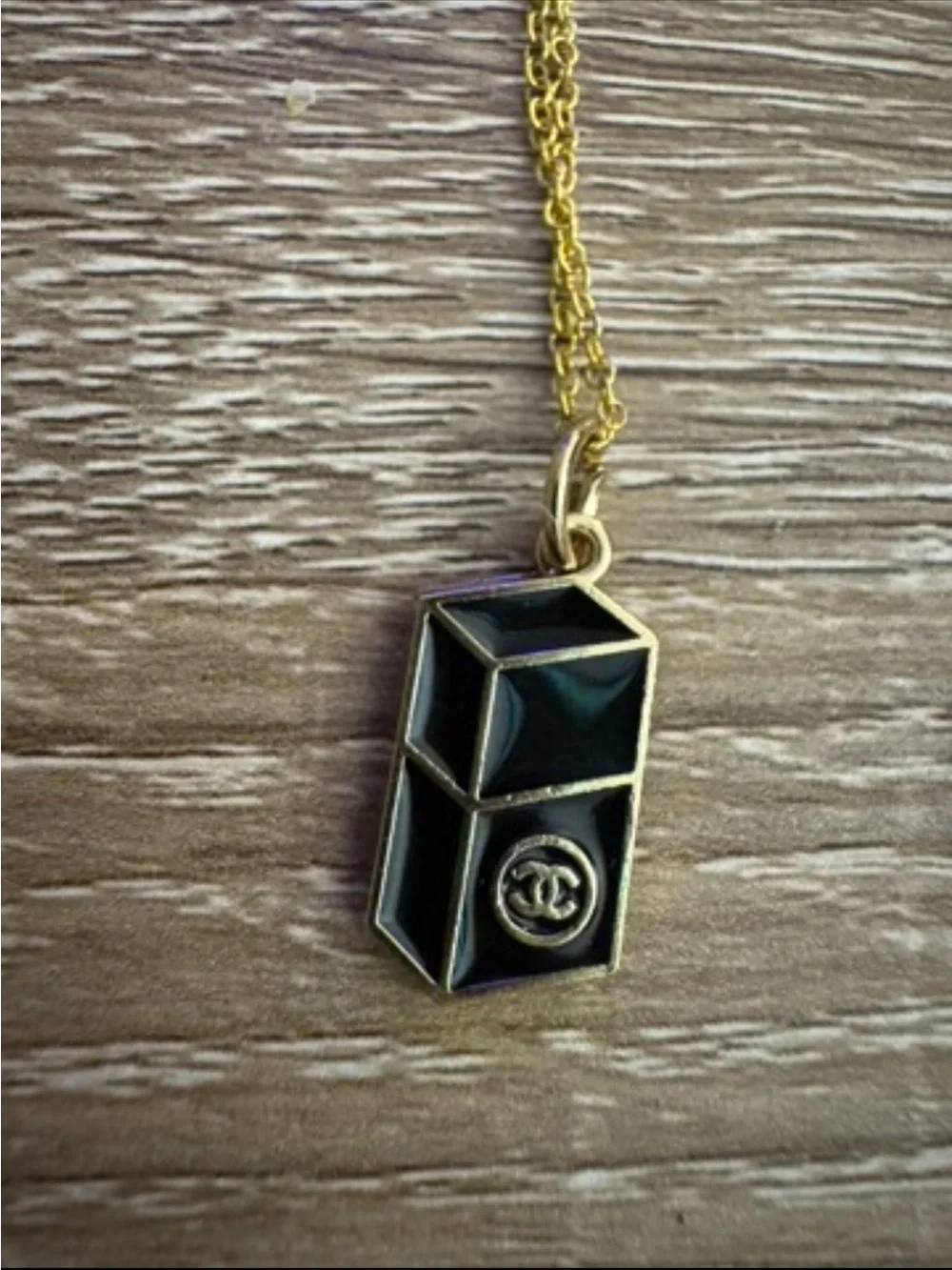 Chanel Black and Gold Lipstick Pendant Necklace